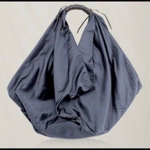 Not selling. Want to buy this margiela satin bag.